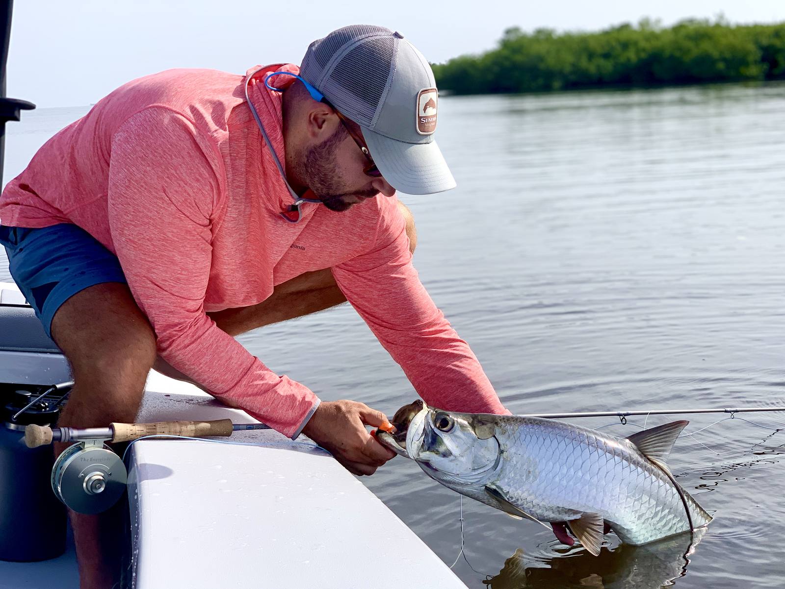 Reviving a tarpon boatside before release